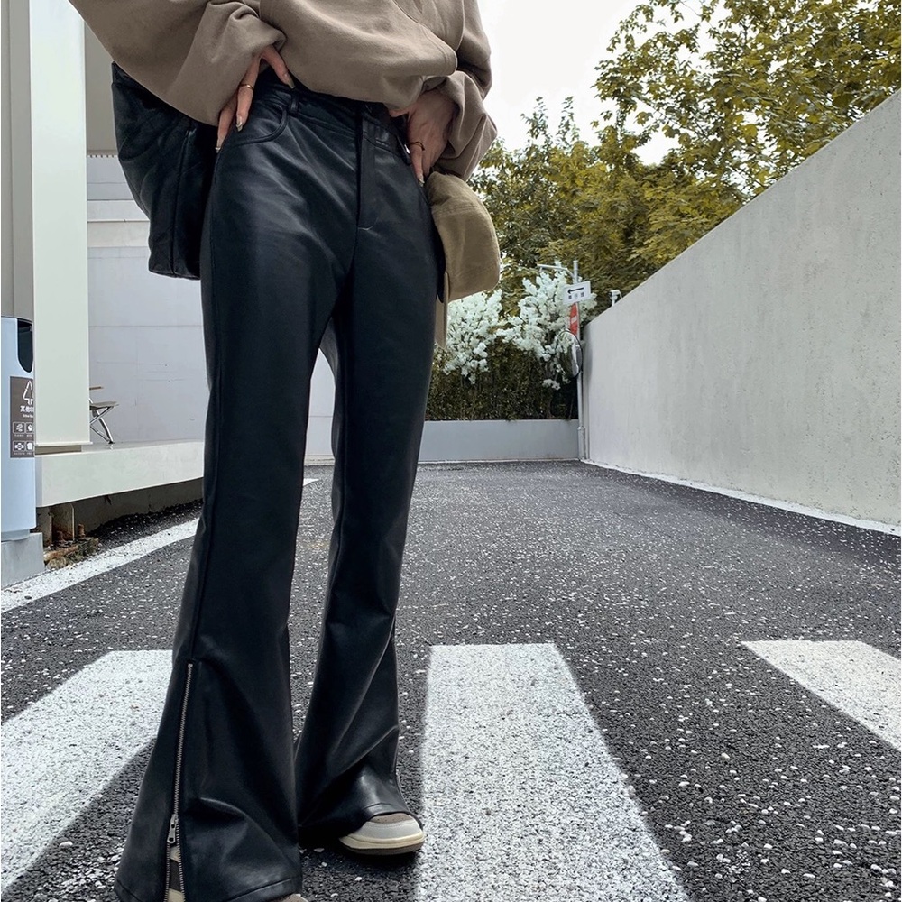 Black leather straight leg pants with flared bottom #leatherpants
